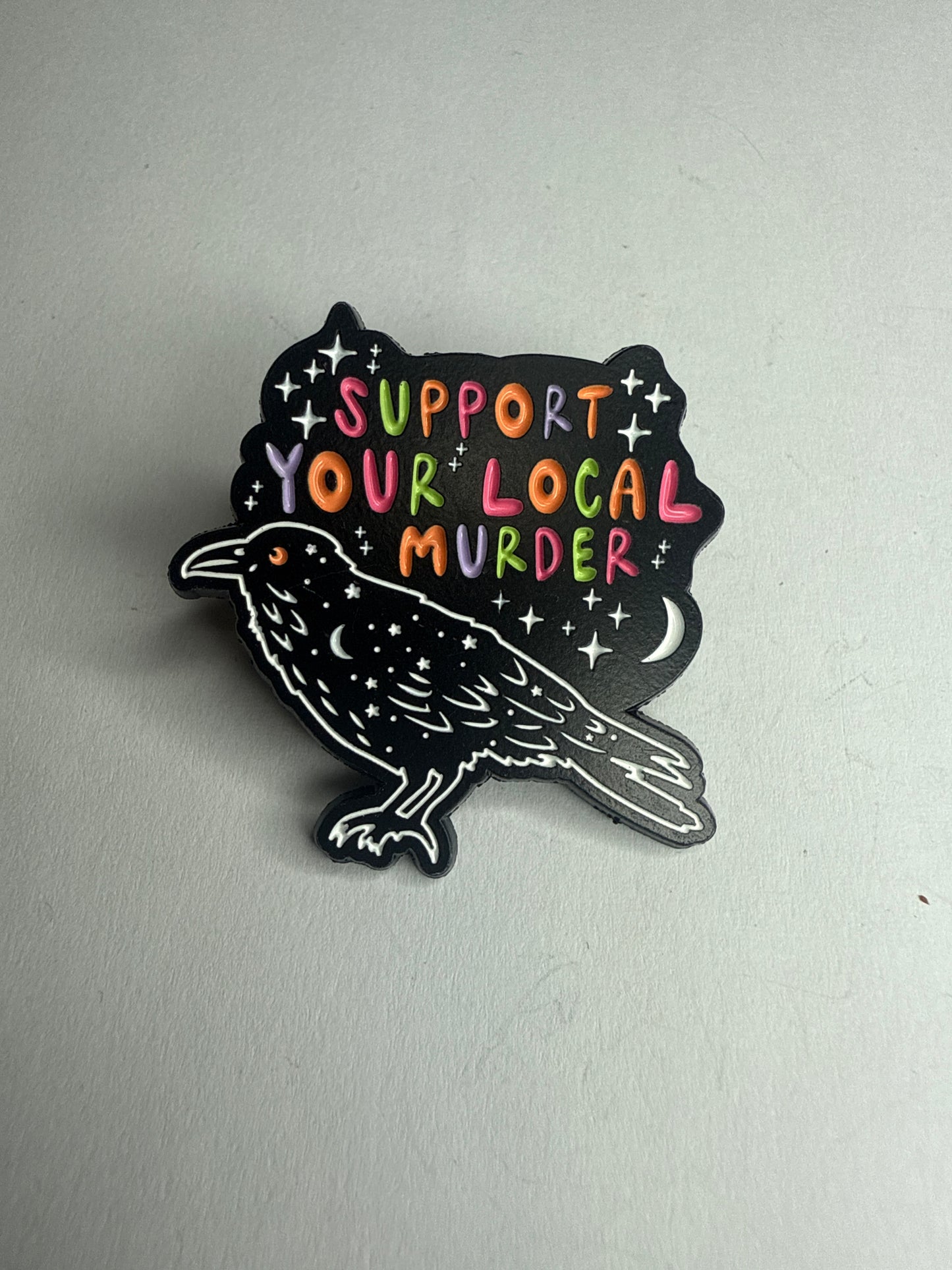“Support your local murder” crow pin