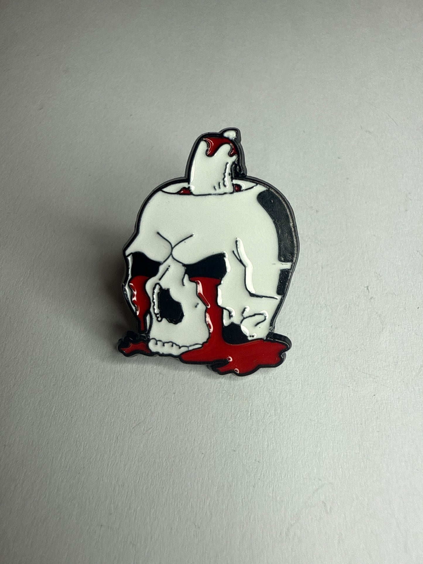 Bleeding skull pin