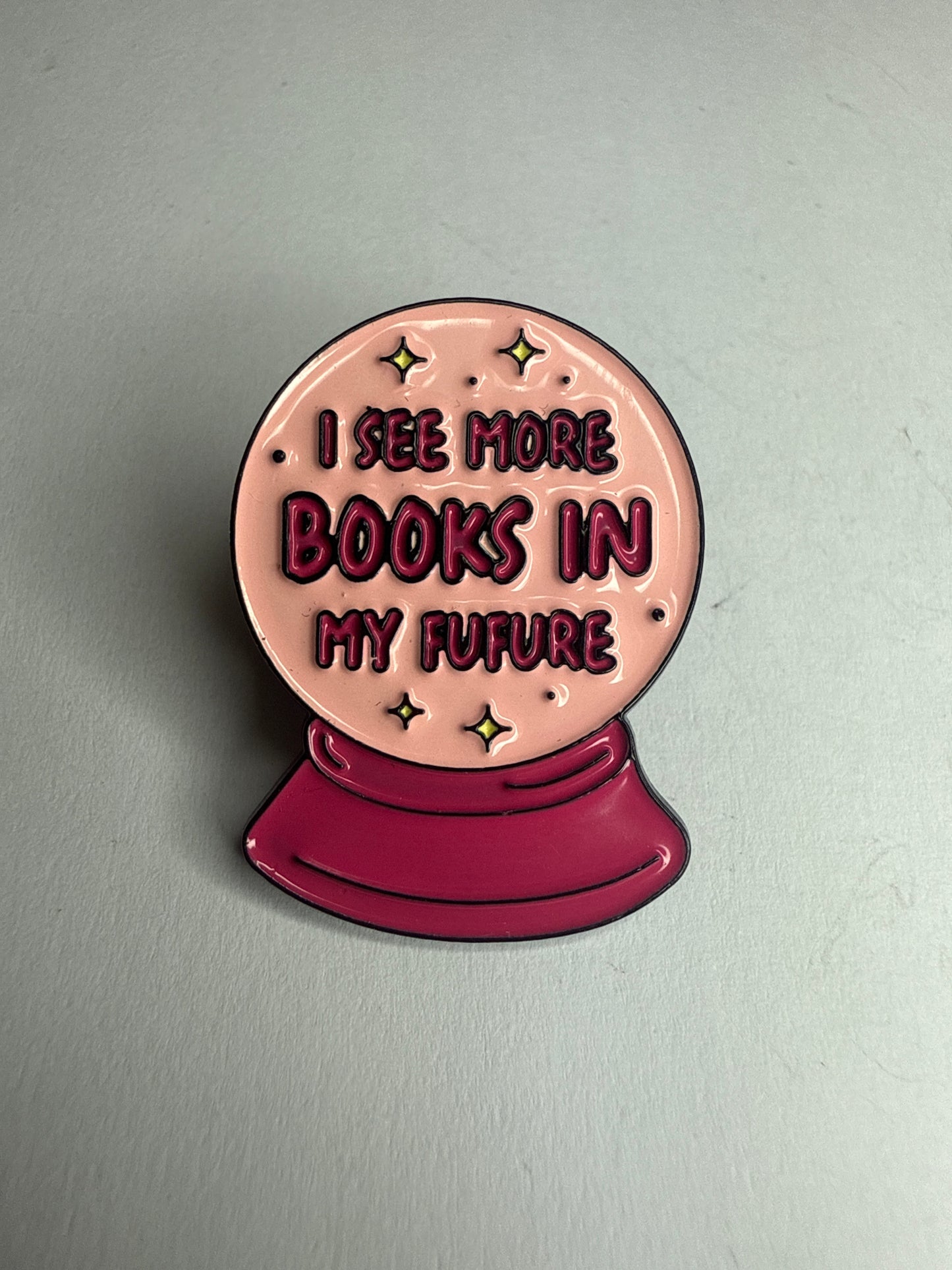 “I see more books in my future” pin