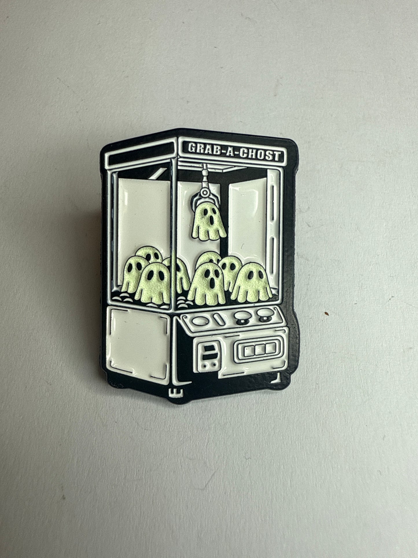 Grab-a-ghost pin