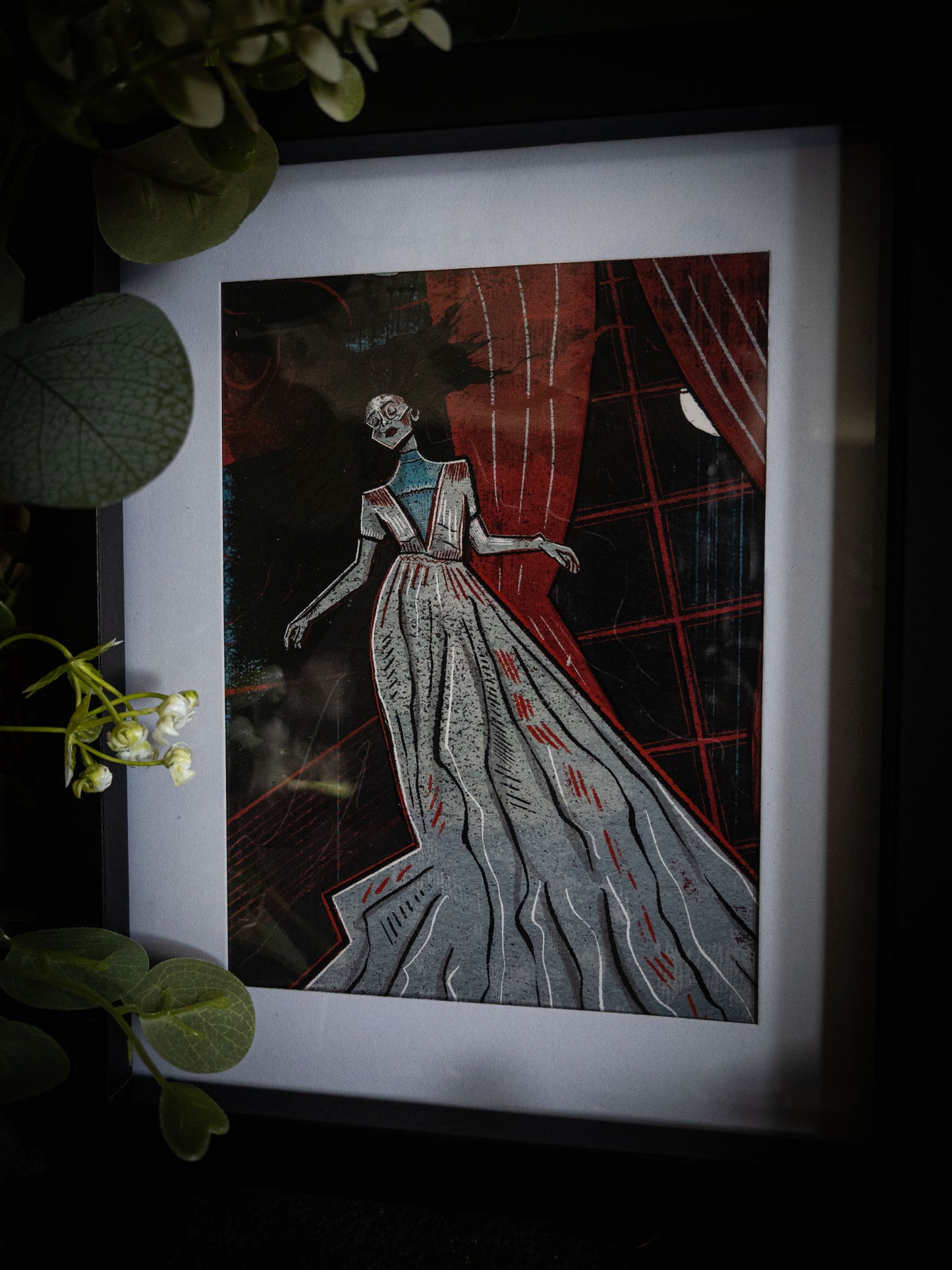 Sophie Atkinson Illustration – The Lady Ligeia Poe print in black frame, close-up detail showing crimson linework and grey gown