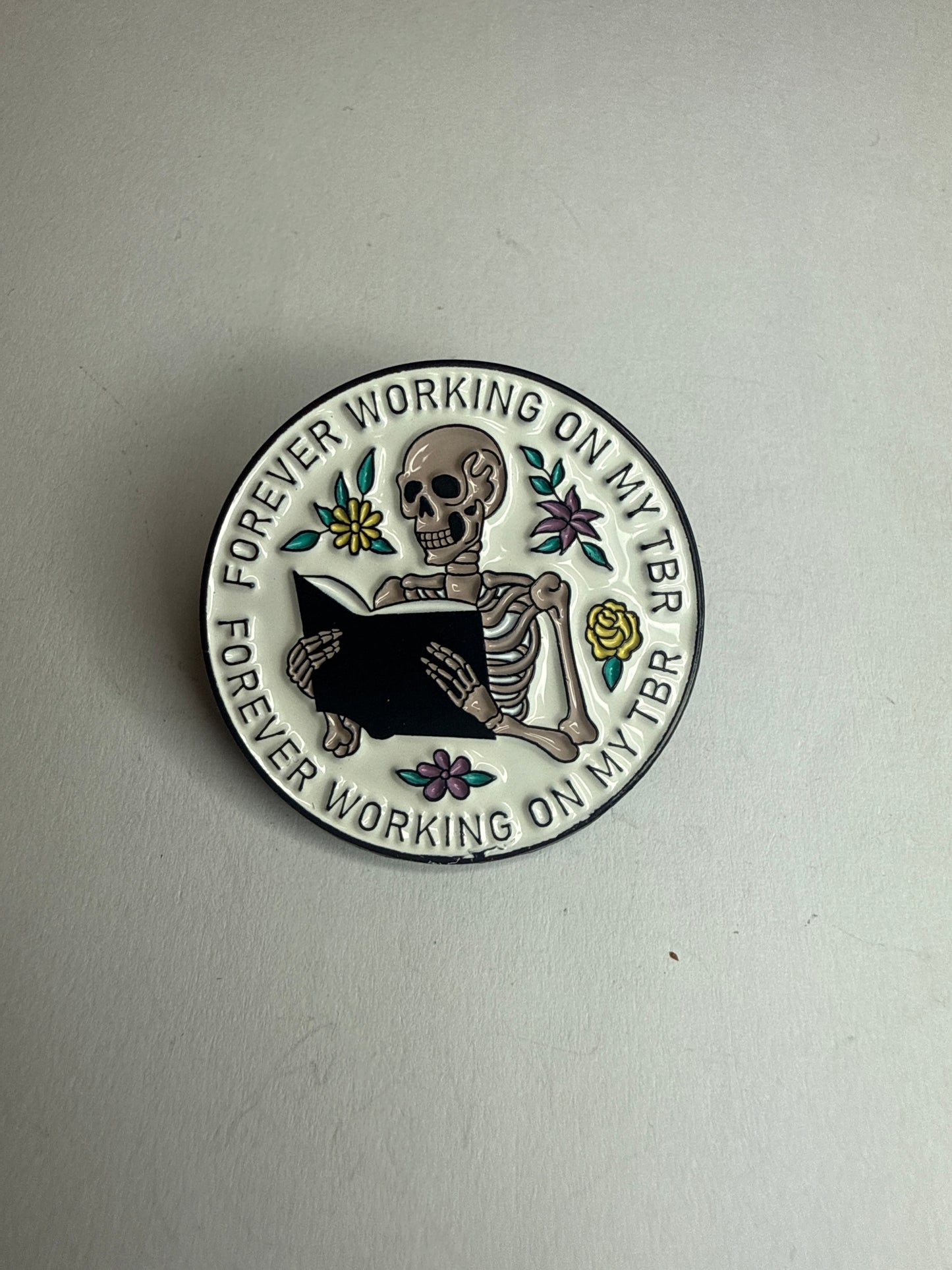 “Forever working on my TBR” pin