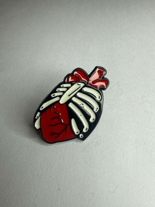 Heart and ribs pin