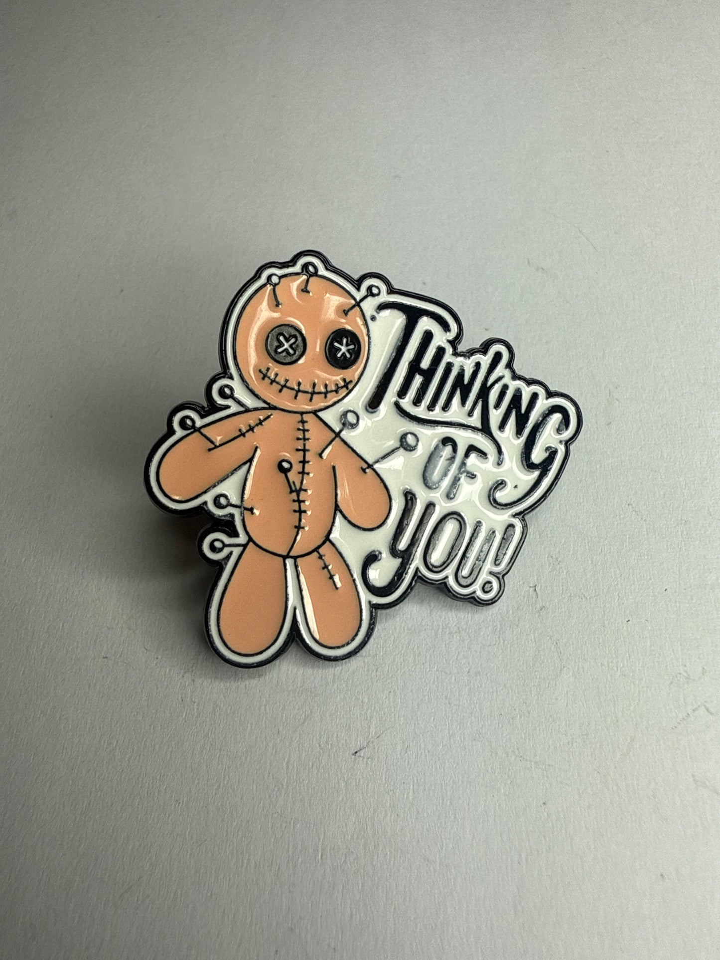 “Thinking of you” voodoo doll pin