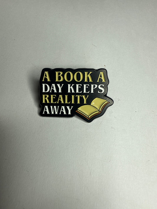 A book a day keeps reality away