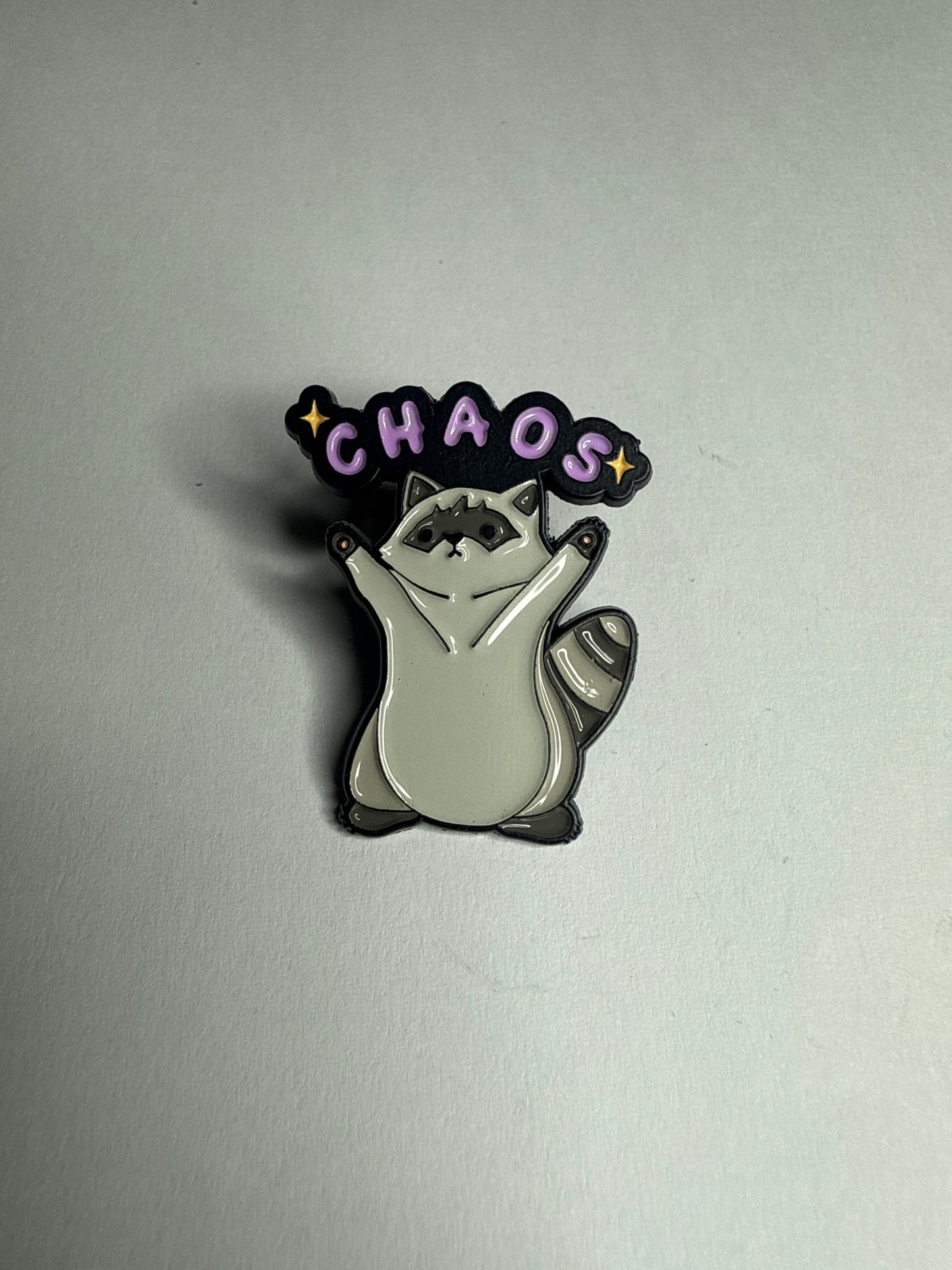 Chaos racoon- enamel pin