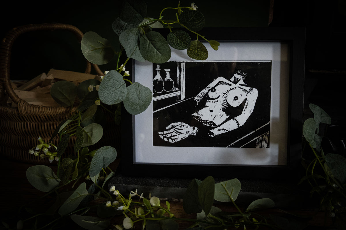 Frankenstein illustrated vignette print — the workshop scene with potion bottles and assembled creature, by Sophie Atkinson