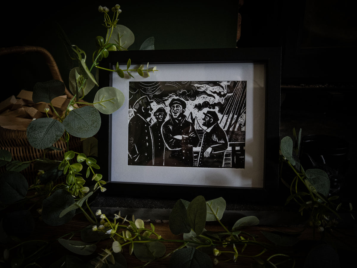The Voyage giclée print displayed with eucalyptus foliage — Frankenstein Arctic expedition crew, gothic artwork by Sophie Atkinson