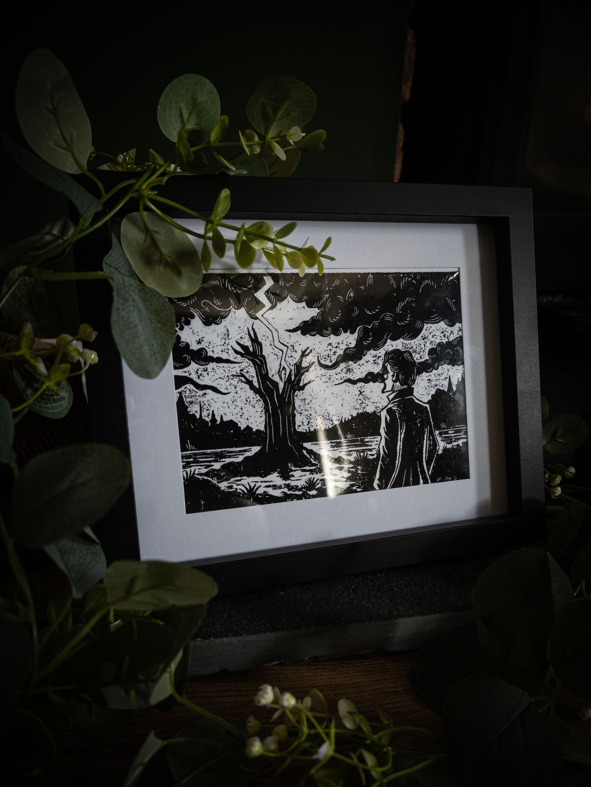 Frankenstein illustrated chapter vignette print in black frame — lightning tree scene, gothic artwork by Sophie Atkinson