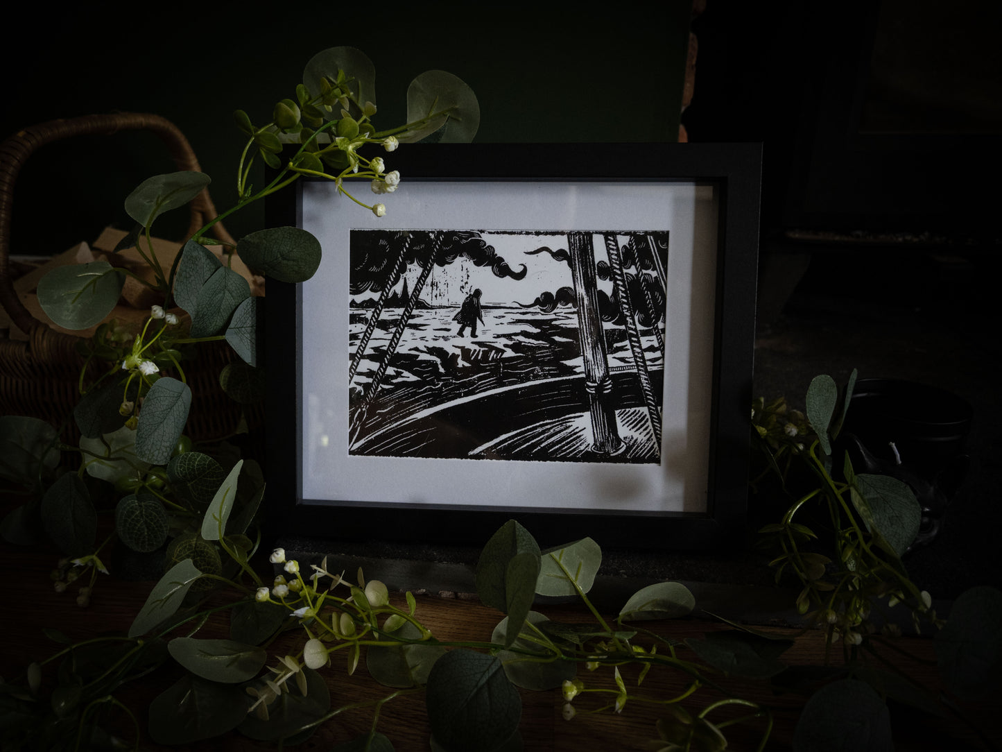 Framed gothic art print of a lone figure on the Arctic ice seen from a ship's deck, from Sophie Atkinson's Frankenstein Illustrated series