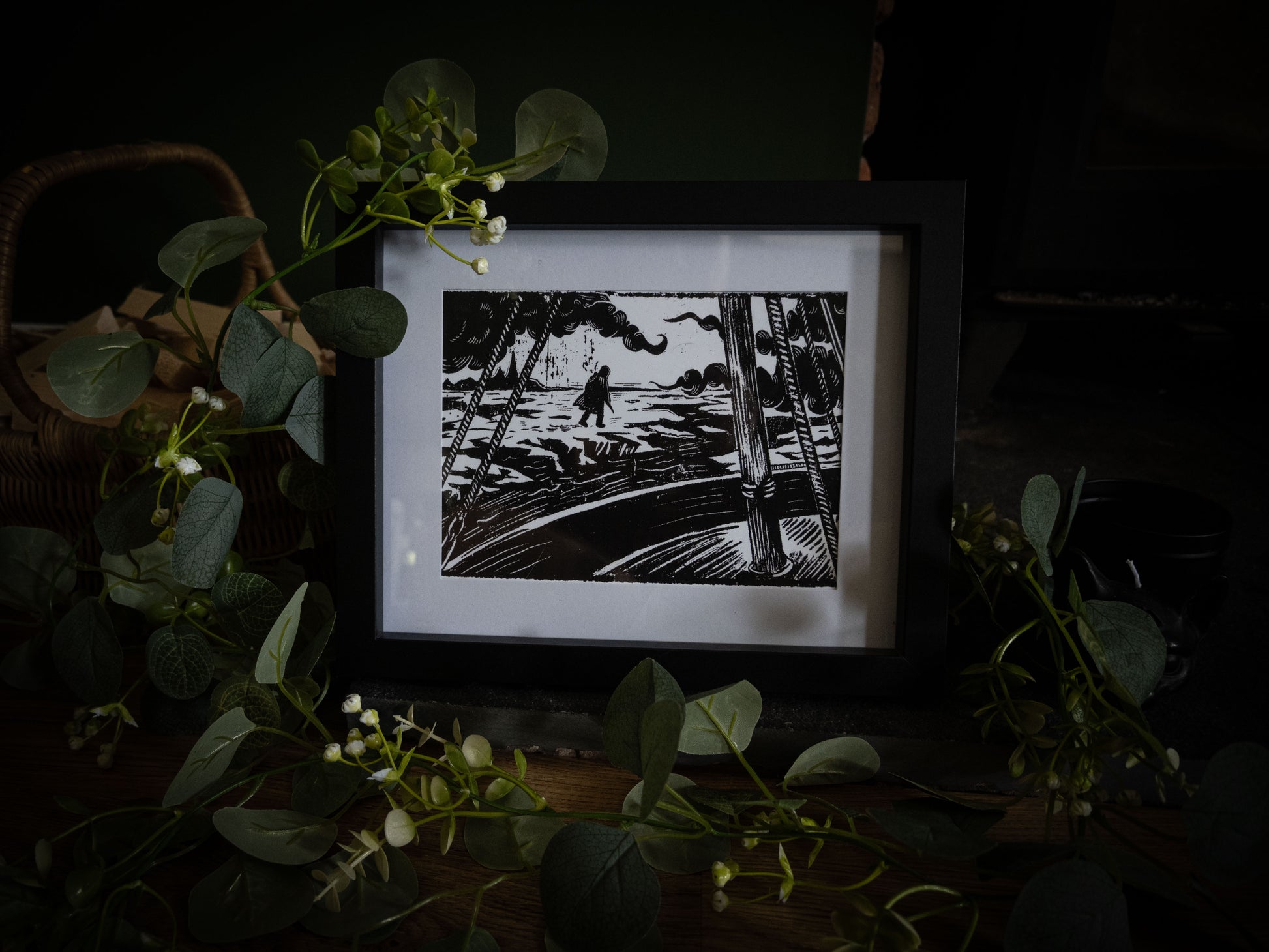 Framed gothic art print of a lone figure on the Arctic ice seen from a ship's deck, from Sophie Atkinson's Frankenstein Illustrated series
