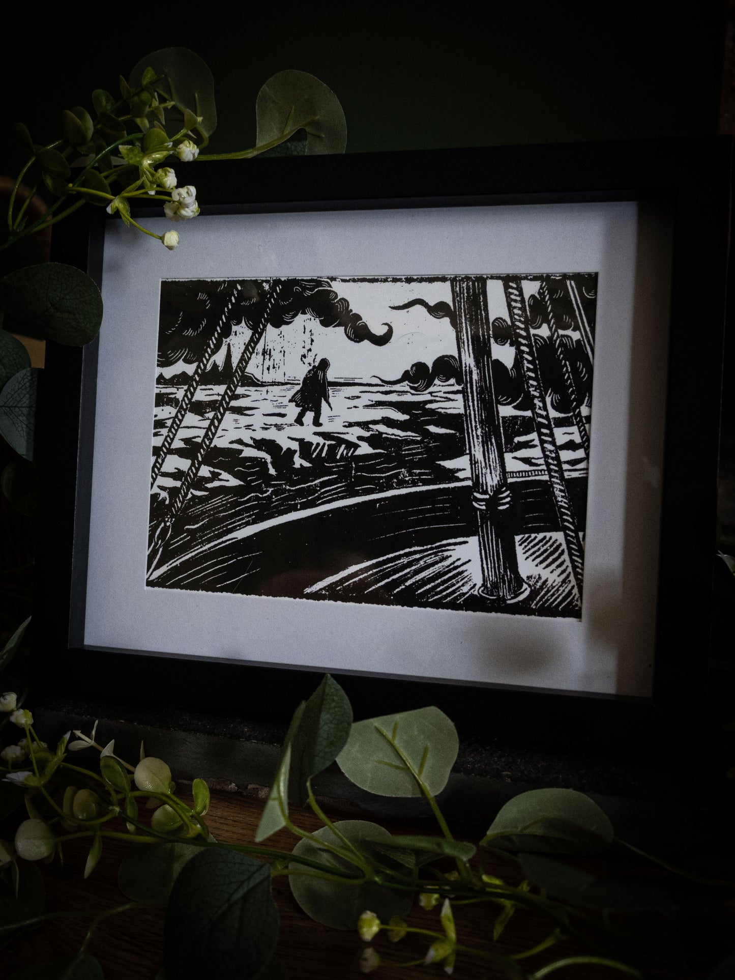 The Figure on the Ice art print wide shot with greenery — lone silhouette on frozen sea framed by ship ropes, gothic illustration by Sophie Atkinson