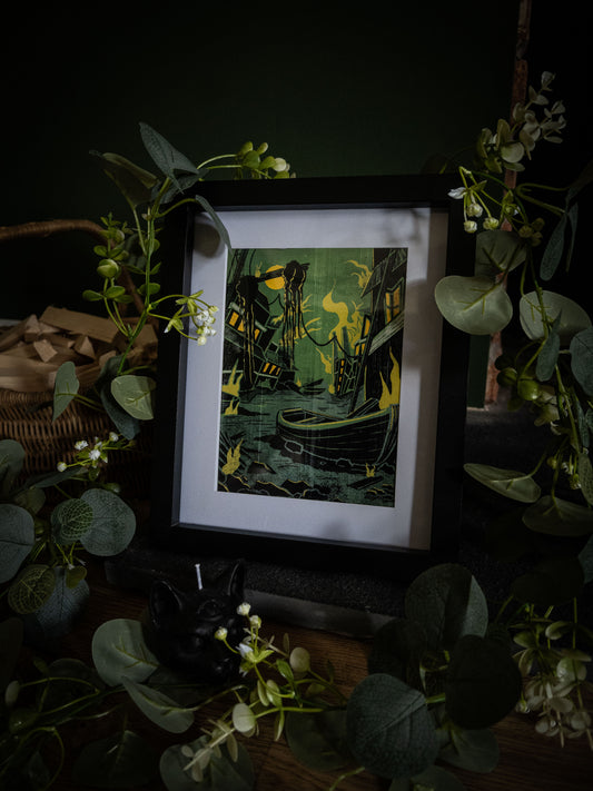Something Wrong in Innsmouth gothic Lovecraft art print in black frame – decaying harbour with tentacled creature and yellow flames, styled with eucalyptus