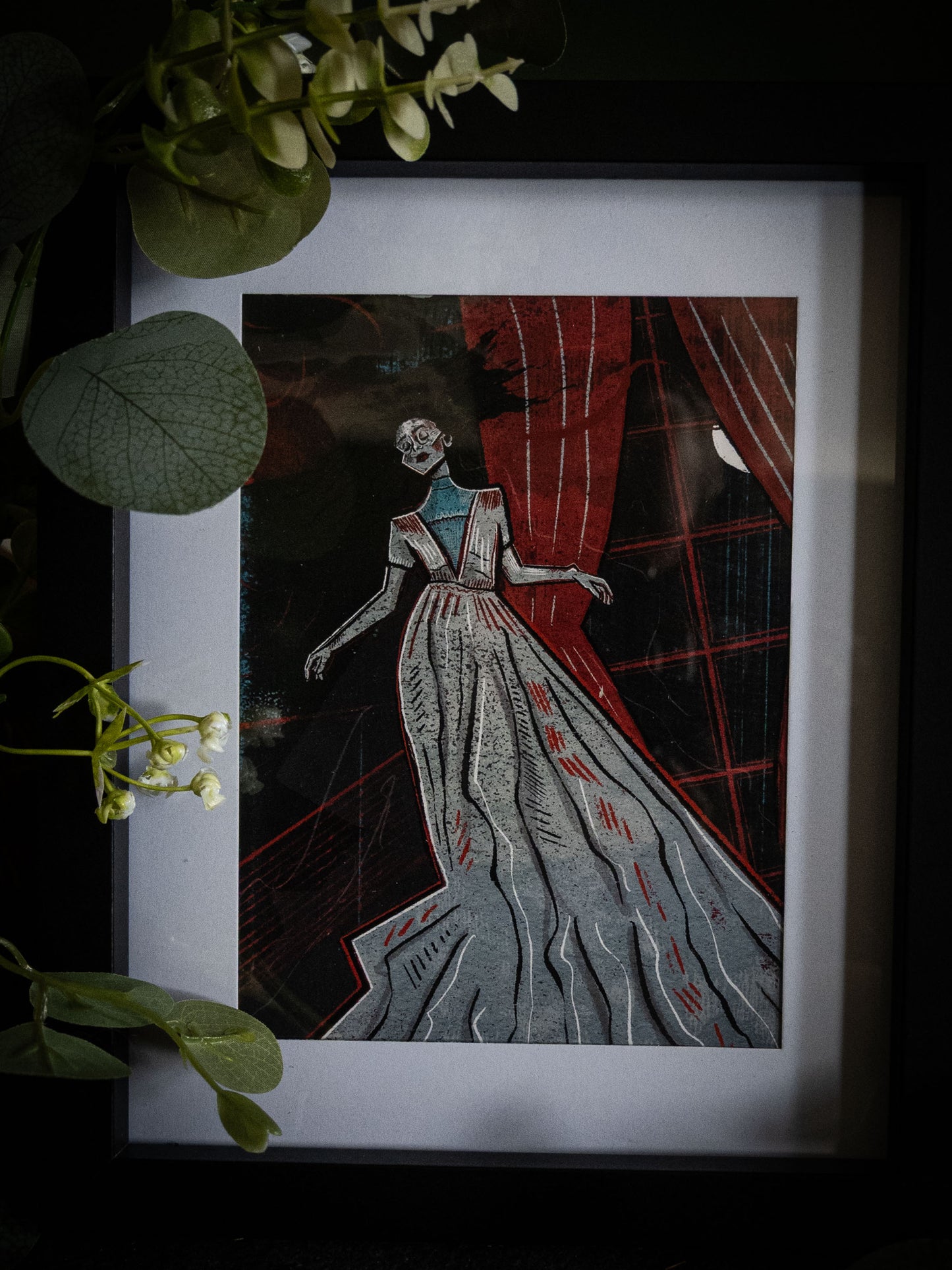 The Lady Ligeia gothic horror print in black frame – full figure view of spectral woman in tattered gown, botanical dark styling with white flowers