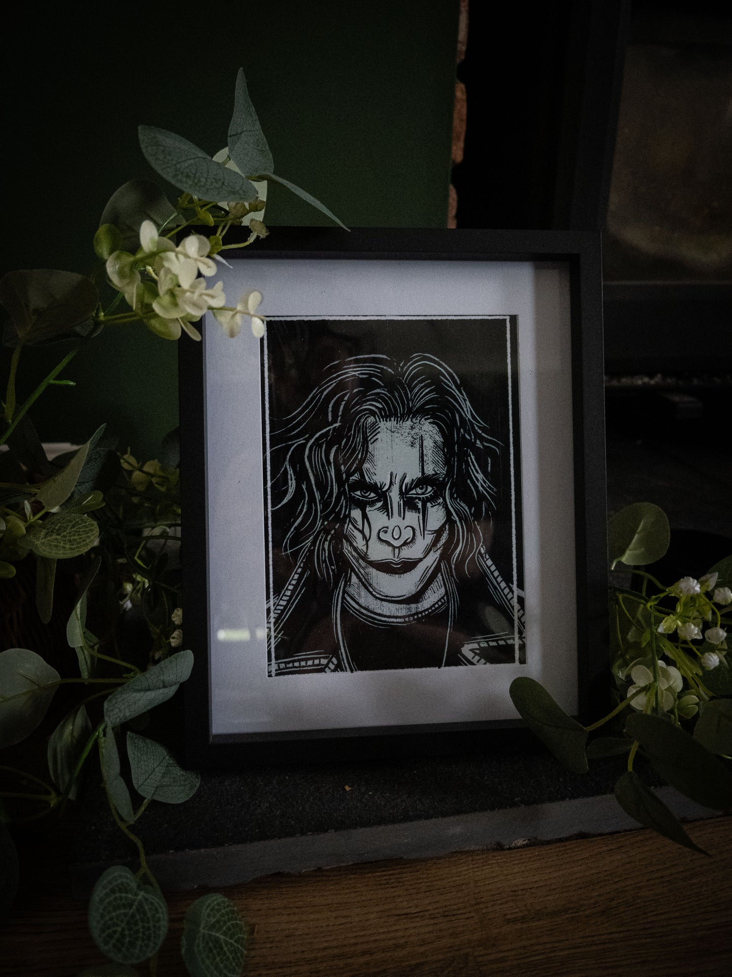 The Crow gothic wall art print in black frame with botanical styling