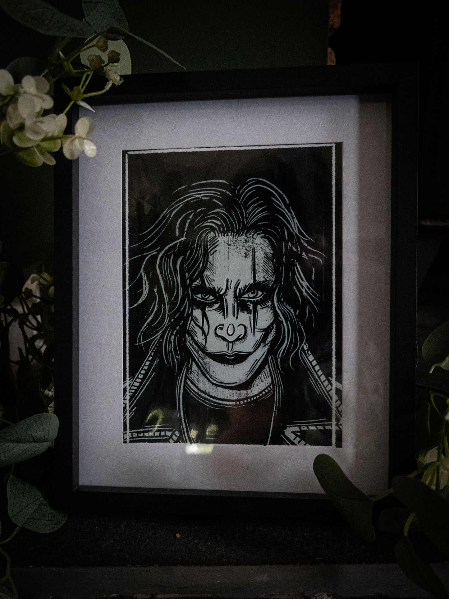 The Crow Eric Draven gothic art print in black frame, close-up styling