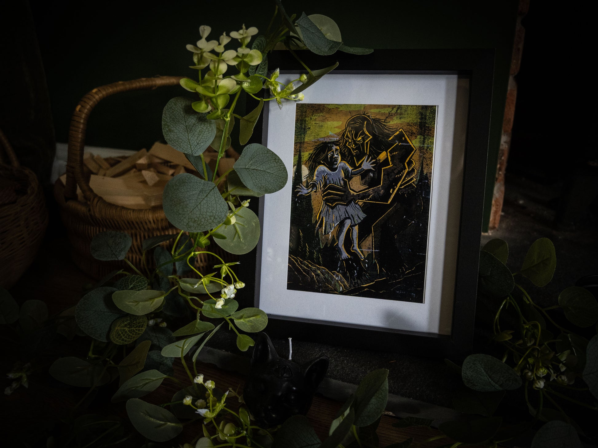 Framed gothic art print showing Frankenstein's creature rescuing a terrified child, from Sophie Atkinson's Frankenstein Illustrated series