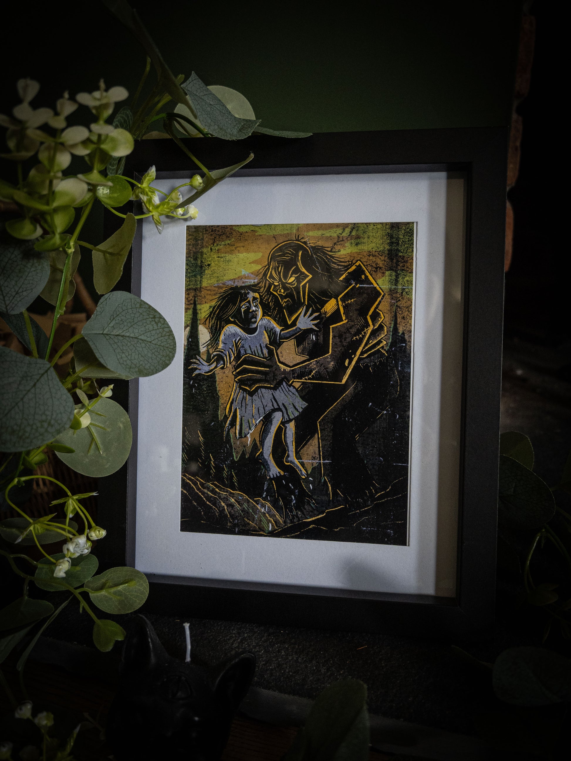Close-up of The Rescue art print — gothic illustration of the creature and a frightened child, dark atmospheric artwork by Sophie Atkinson