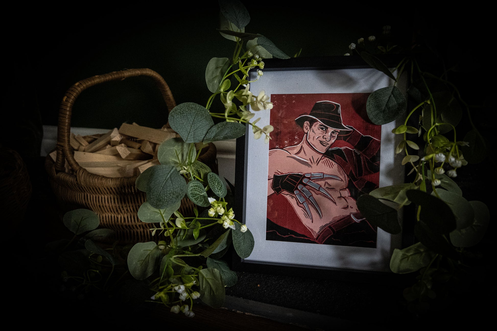 Freddy Krueger horror pinup art print in black frame with eucalyptus — gothic wall art by Sophie Atkinson
