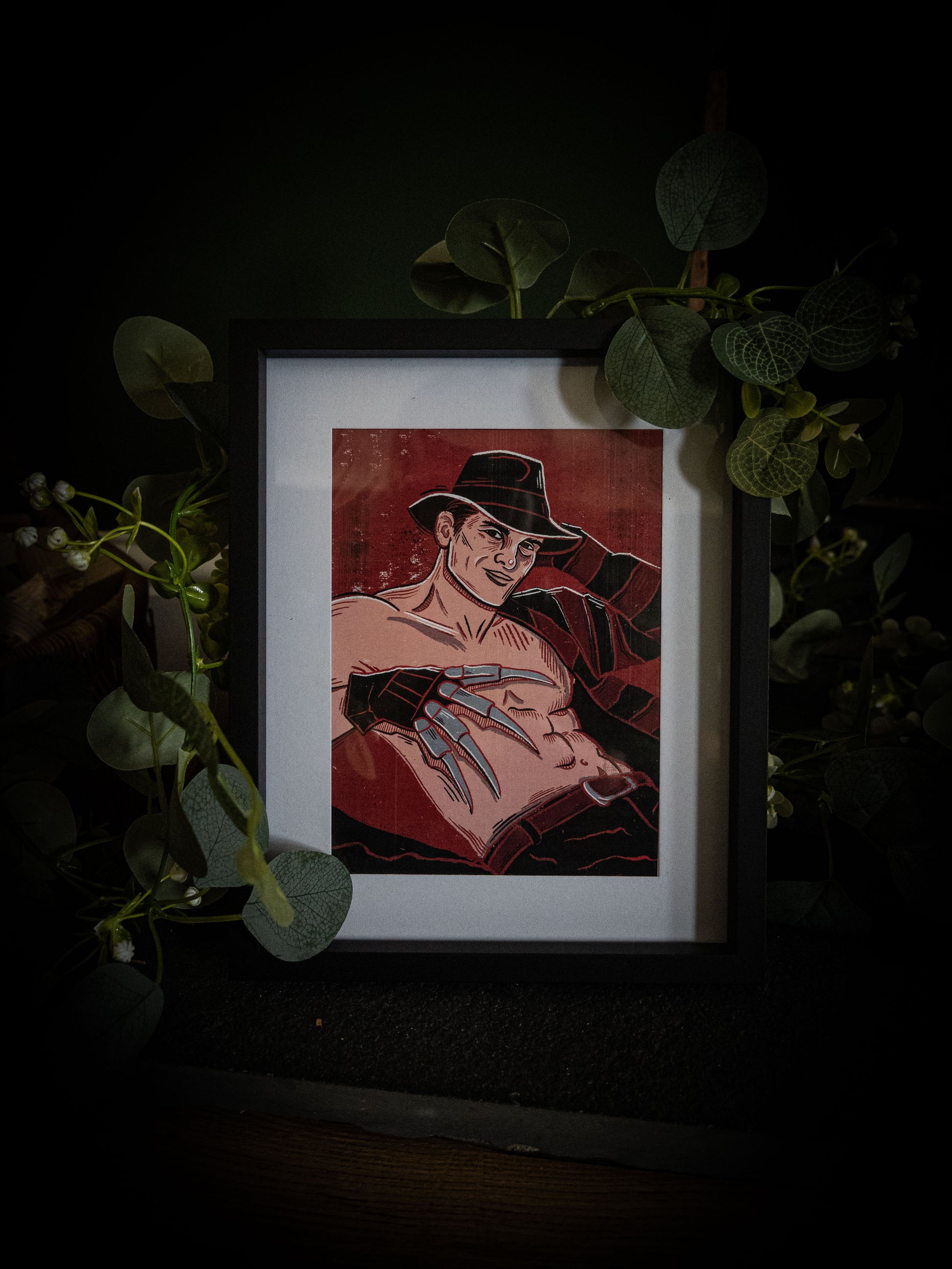 Sexy Freddy Krueger pinup print close-up — deep red woodblock illustration, claw glove detail, gothic horror art