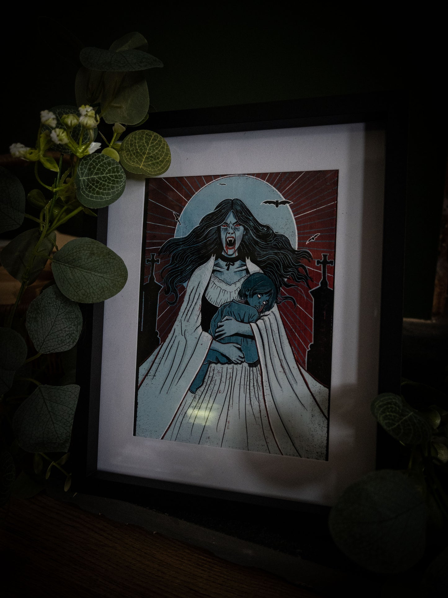Lucy Westenra vampire print framed, styled with eucalyptus and white blooms
