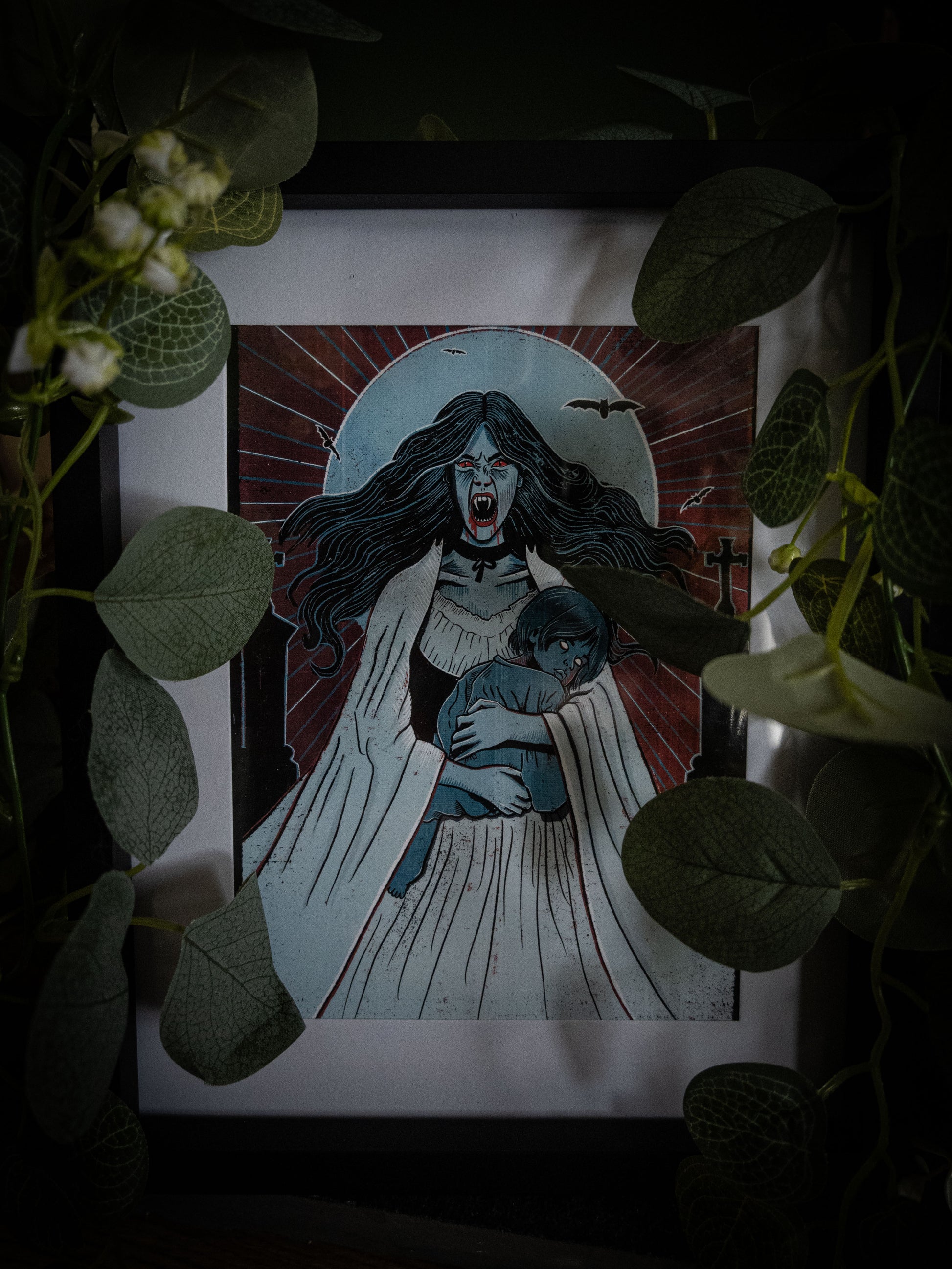 Lucy Westenra art print framed in black with botanical styling