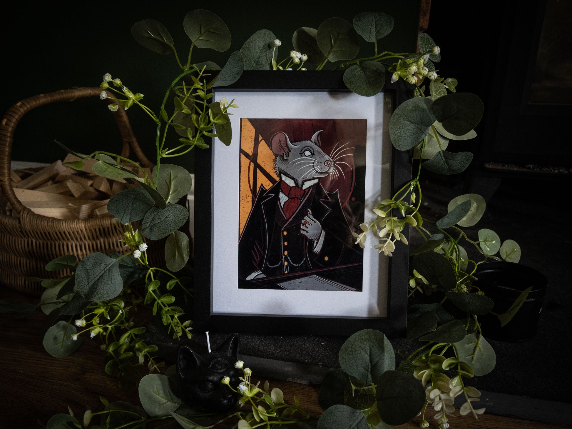 Mr. Whiskers Esq. Victorian rat art print in black frame surrounded by trailing eucalyptus foliage